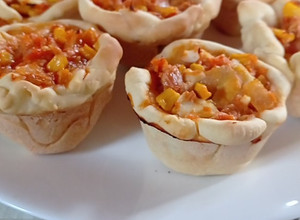 Una foto de Canastitas de atún y choclo 🤤