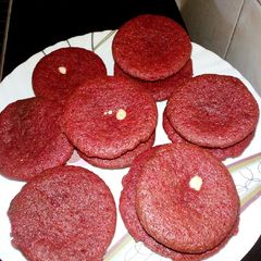 A picture of Red velvet cupcakes with nut's.