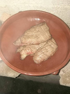 Una foto de Picaña al horno de leña