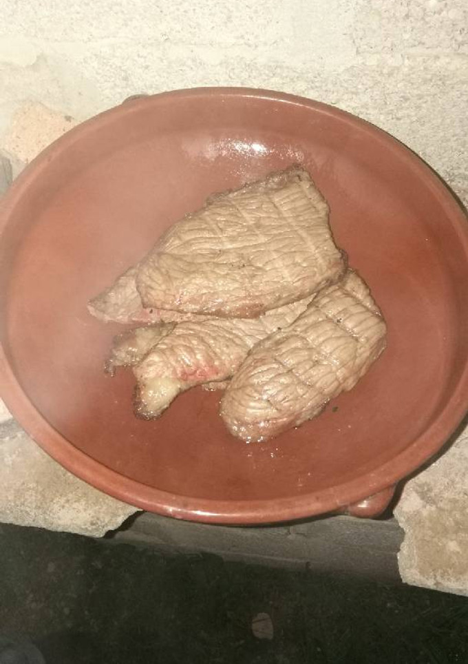 Una foto de Picaña al horno de leña