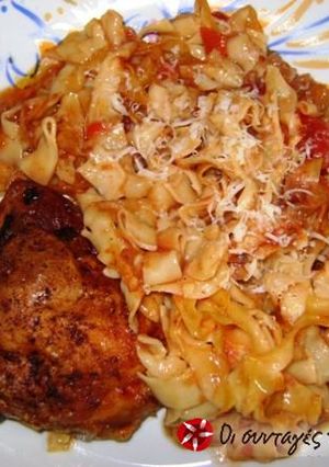 A picture of Chicken with hilopites in the oven.