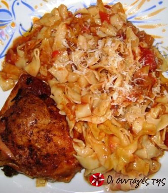 A picture of Chicken with hilopites in the oven.