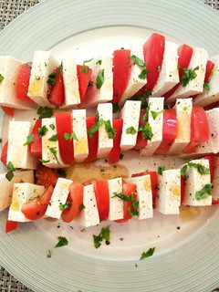 A picture of Tofu and Tomato salad.
