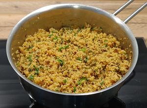 Una foto de Guarnición express: cous-cous con espinacas baby