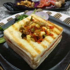 A picture of Sandwich in teriyaki paneer.