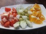 Ensalada de tomate, alcachofa y naranja