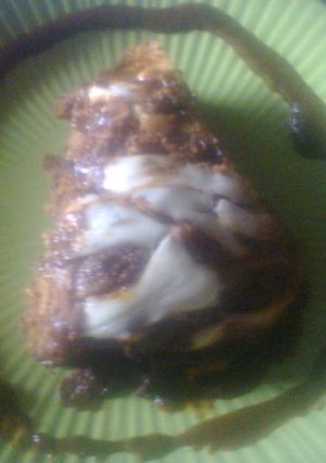 Una foto de Pastel azteca de mole familiar