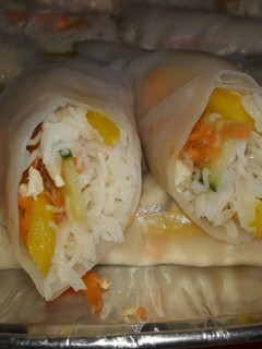 A picture of Vietnamese spring rolls and spicy dip.