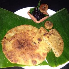 A picture of Coconut stuffed parandaa.