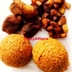 Jollof Rice/plantain served with Ram meat A picture of Jollof Rice/plantain served with Ram meat.