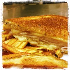 A picture of Smoked Turkey  Reuben Sandwich.