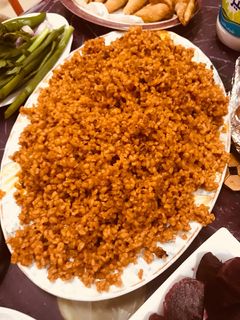 صورة لوصفة برغل بندورة بالطماطم المعلبة