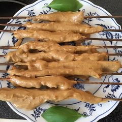 A picture of California Farm Seitan Mock Pork Sateh In Peanut Sauce.