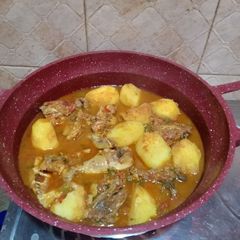 A picture of Marinated chicken stew with potatoes.