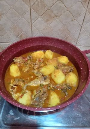 A picture of Marinated chicken stew with potatoes.