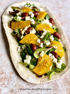 Una foto de Ensalada de espinacas y naranja