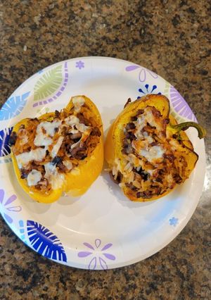 A picture of Stuffed Pepper with turkey burger.