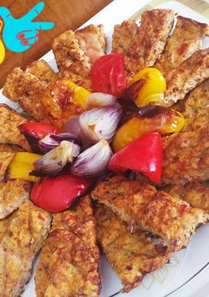 A picture of Chicken Kebab with Roasted Vegetables.