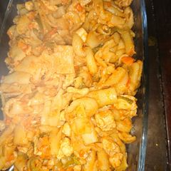 A picture of Pasta tomato sauce in chicken.