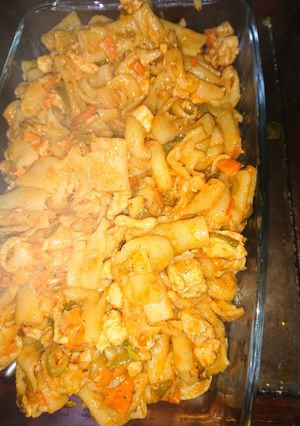 A picture of Pasta tomato sauce in chicken.