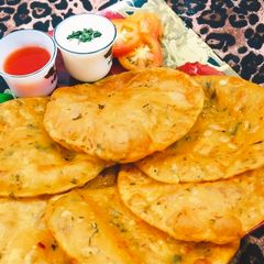 A picture of Masaledar aloo puri.