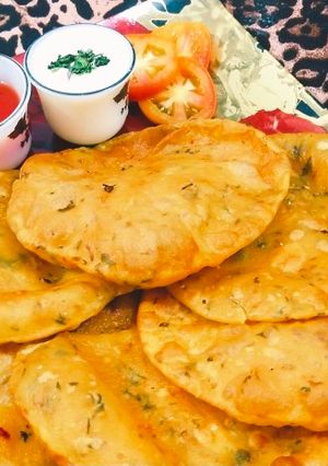 A picture of Masaledar aloo puri.