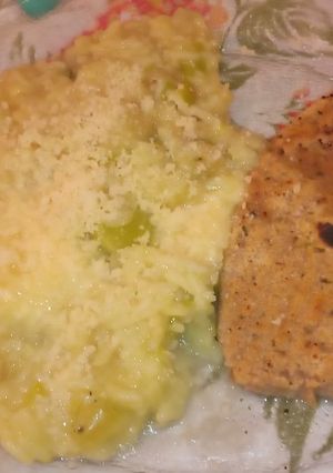 Una foto de Arroz con puerro, verdeo, cebolla y queso