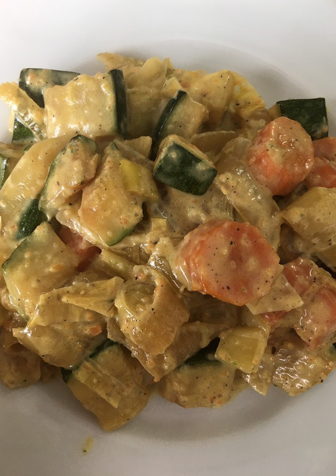 Una foto de Verduras cremosas al curry