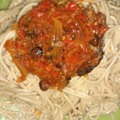 A picture of Spaghetti and fish sauce.
