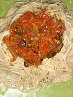 A picture of Spaghetti and fish sauce.