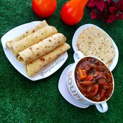 A picture of Lefse with chicken vegetable soup.