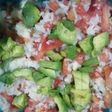 Ensalada fresquita de arroz, tomate, palta, y muzzarella