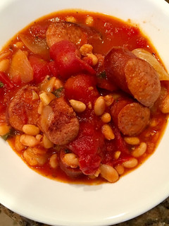 A picture of Andouille Sausage with White Beans in Tomato Sauce.