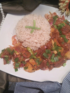 A picture of Sweet And Sour Beef Chilli Dry With Garlic Rice.