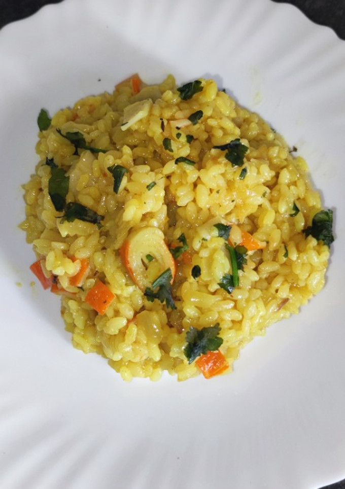 Una foto de Arroz con surimi al curry en Olla GM D