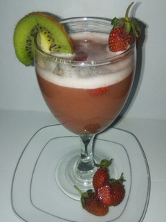 A picture of Strawberry, kiwi fruit, pineapple, melon mixed juice...