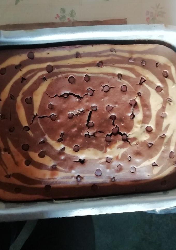 Una foto de Torta marmoleada con chispas de chocolate 🦓