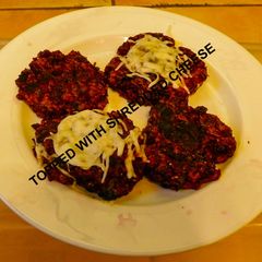 Veggie Patties with red cabbage, beet root, red onions and bell pepper A picture of Veggie Patties with red cabbage, beet root, red onions and bell pepper.