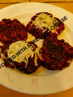 A picture of Veggie Patties with red cabbage, beet root, red onions and bell pepper.