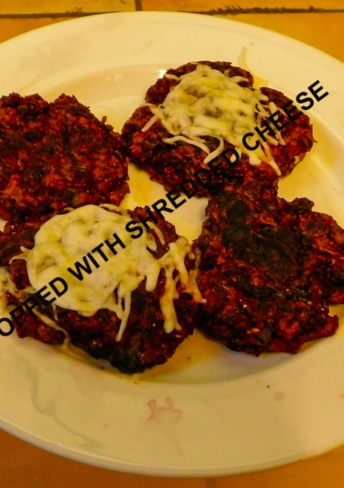 A picture of Veggie Patties with red cabbage, beet root, red onions and bell pepper.