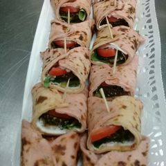 A picture of Beet Root Bread with Falafel fillings.