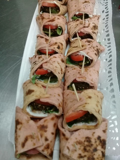 A picture of Beet Root Bread with Falafel fillings.