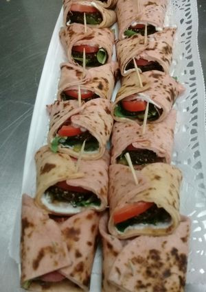 A picture of Beet Root Bread with Falafel fillings.