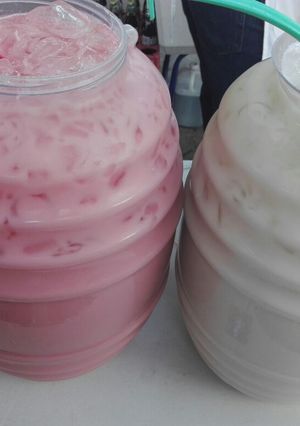 A picture of Agua Fresca for Sale (Horchata and Strawberry Horchata).