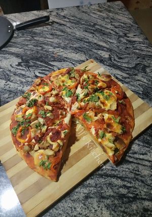A picture of Cheesy chicken pizza.