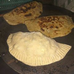 Aloo Matar Paneer Paratha A picture of Aloo Matar Paneer Paratha.