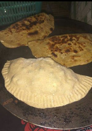 A picture of Aloo Matar Paneer Paratha.