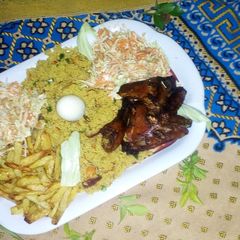 Fried cous cous,chicken with coleslaw and chips A picture of Fried cous cous,chicken with coleslaw and chips.