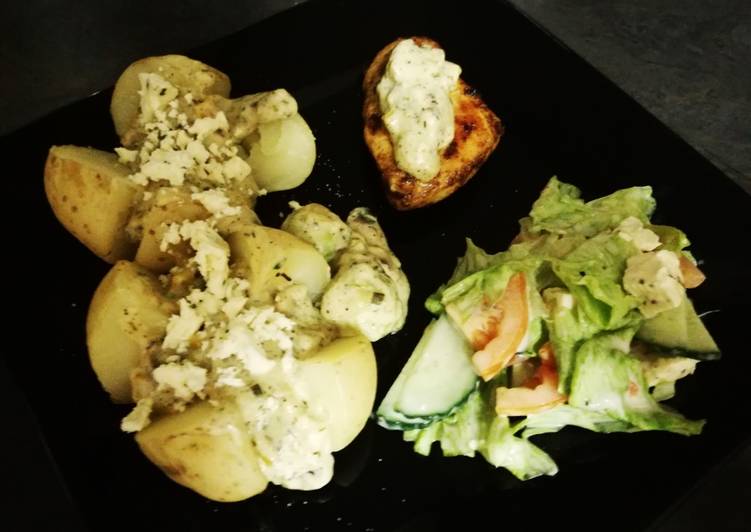 Baked potato and chicken breasts