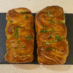 A picture of Fluffy puff pastry butter loaf (with butter glaze).